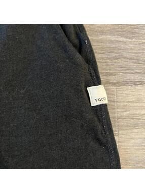 black Vuori shorts with drawstrings